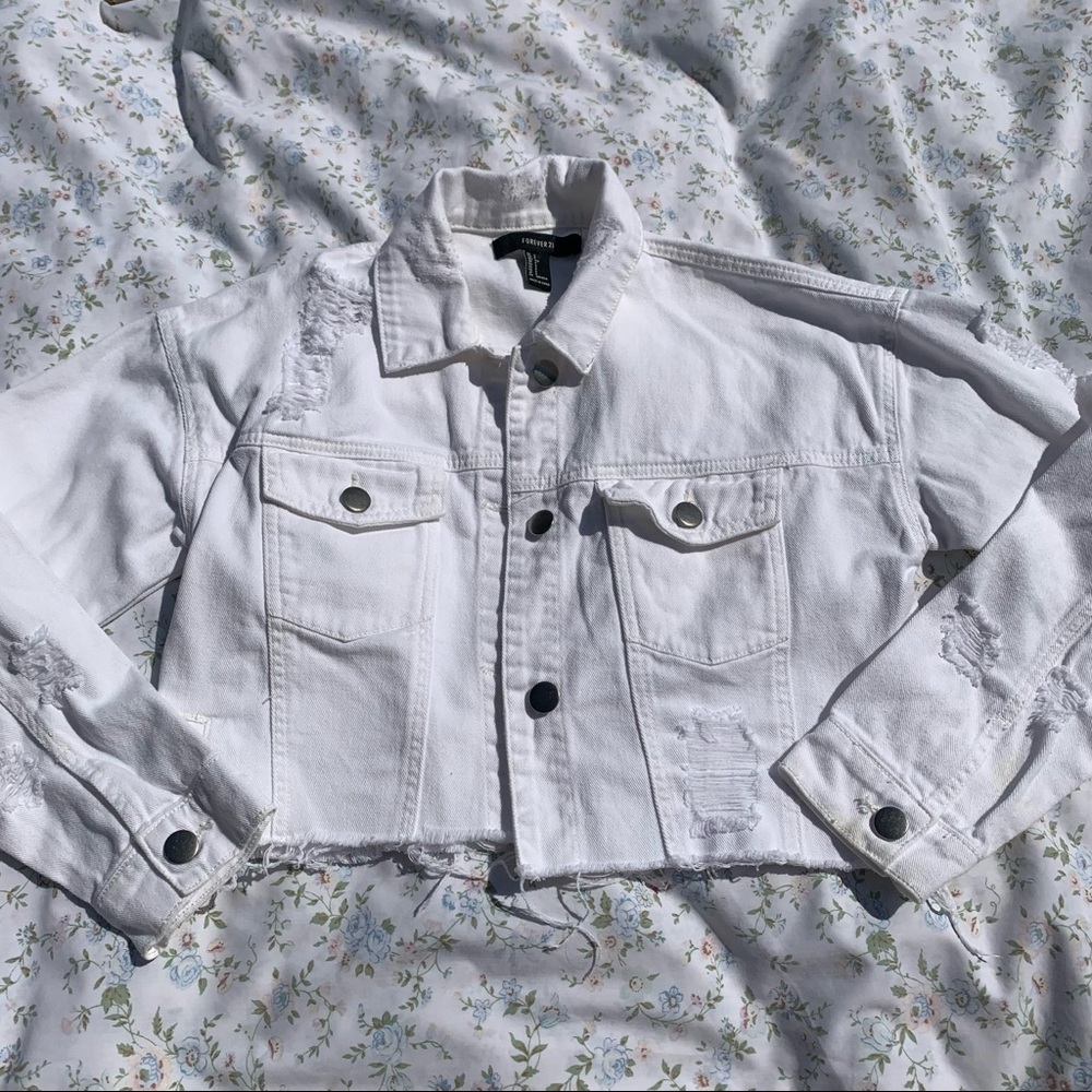 Cropped white distressed denim jacket from Forever 21
